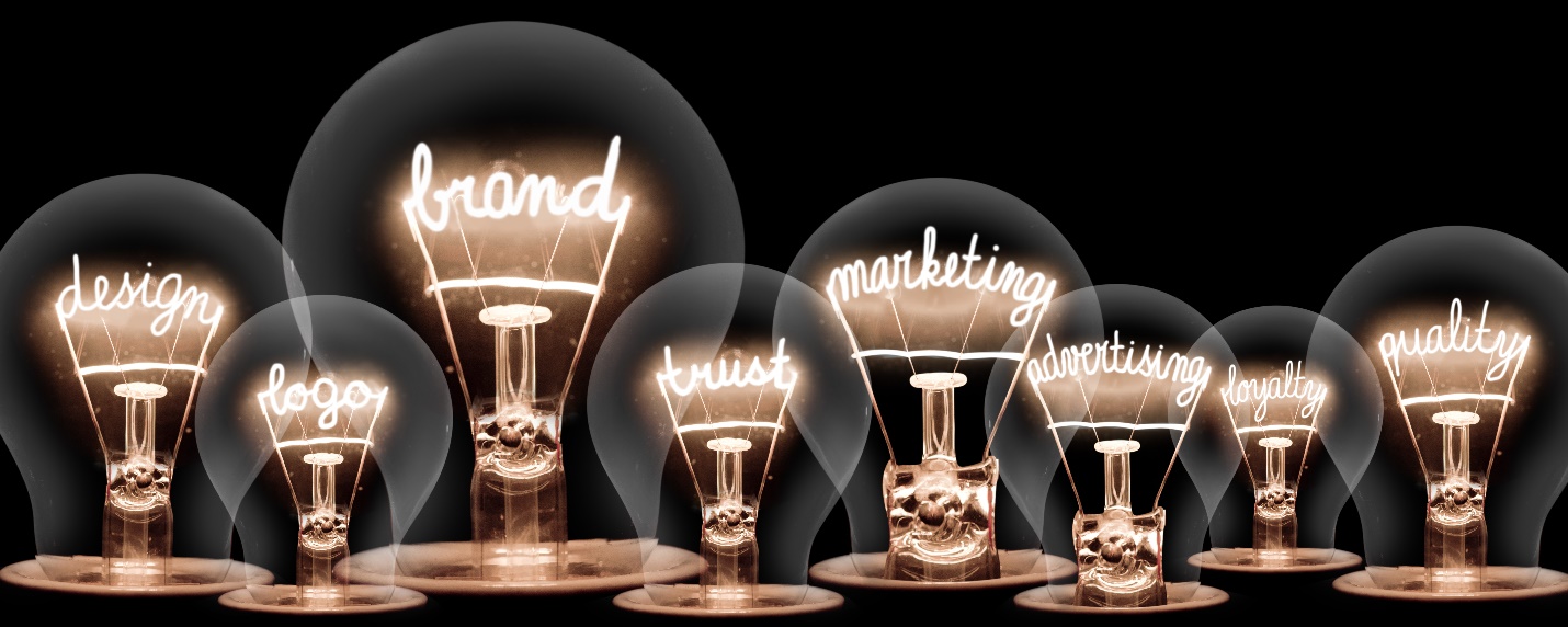 A group of light bulbs with writing on them
Description automatically generated